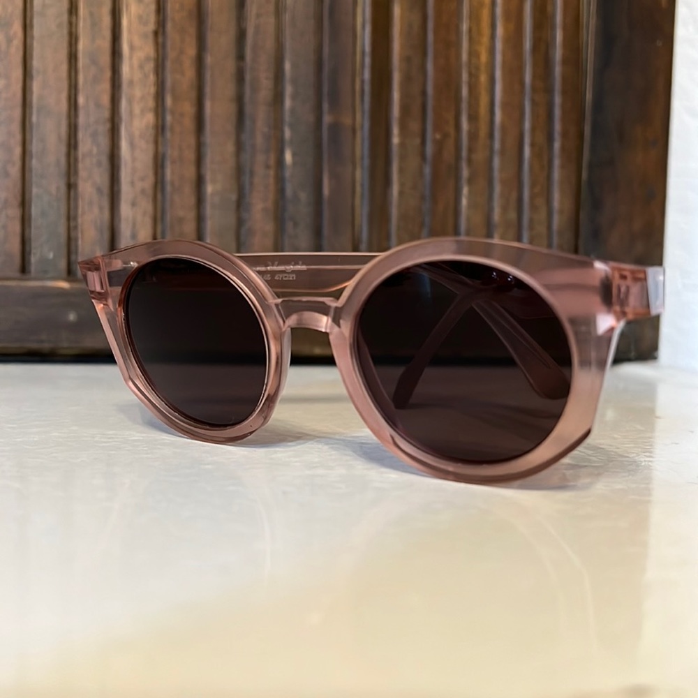 Mykita + Maison Margeila raw series blush pink sunglasses with a backside AR